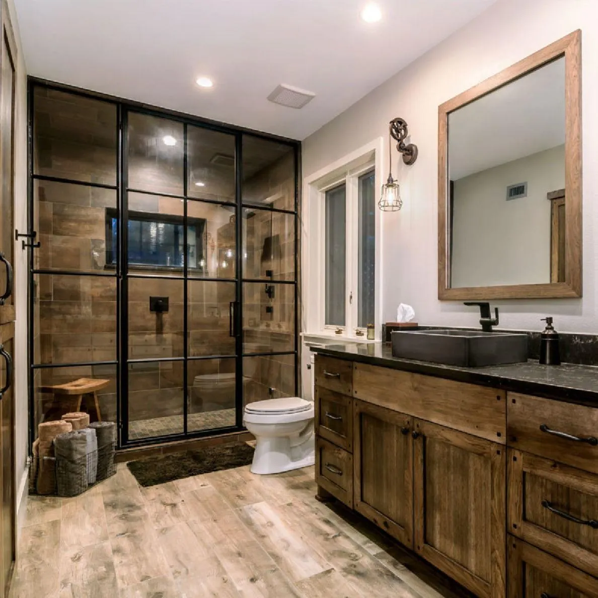 Rustic bathroom with glass shower and wood vanity