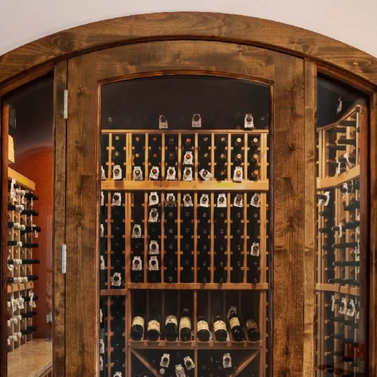 Custom wooden wine cellar with bottle storage racks