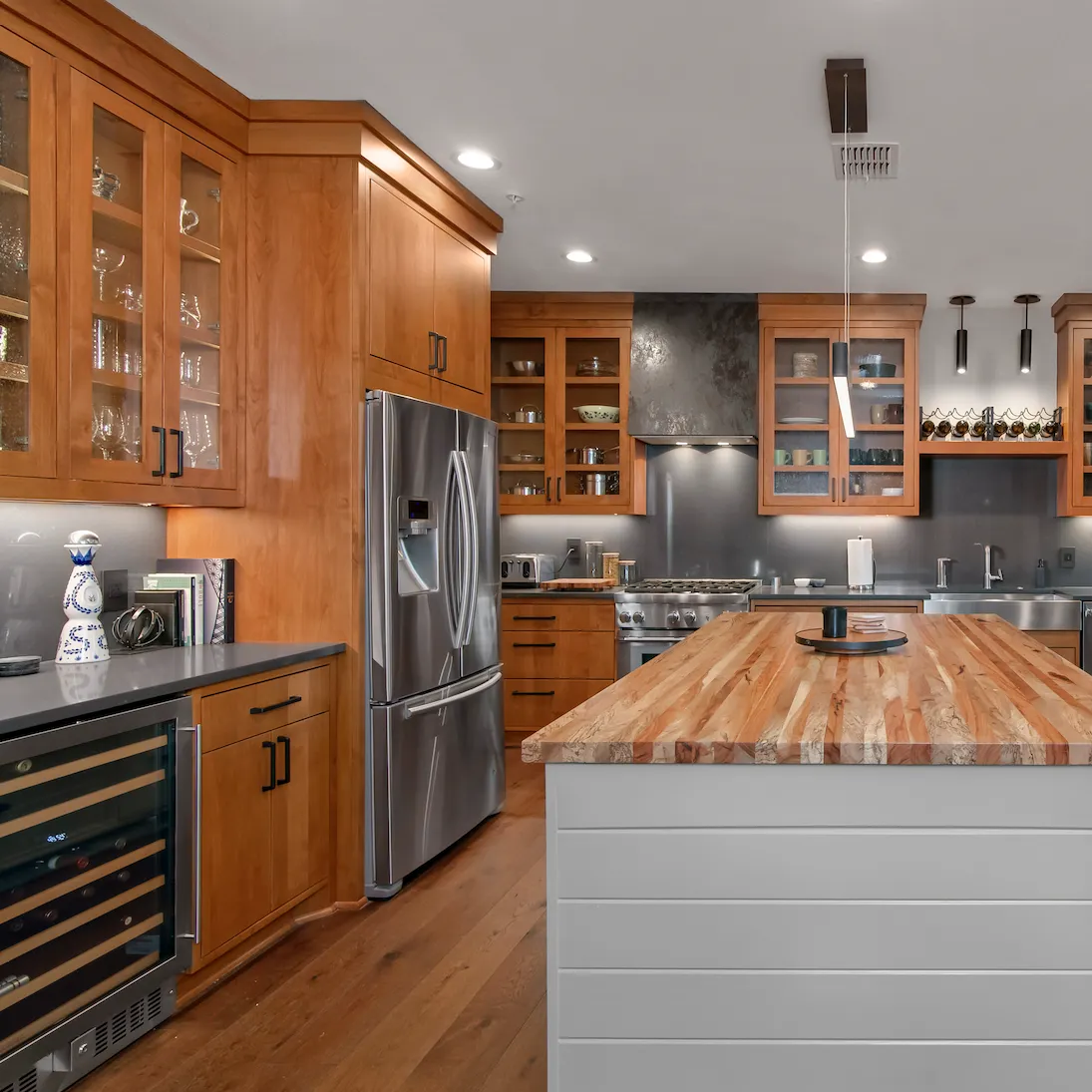 Double-sink bathroom vanity with tall storage cabinets