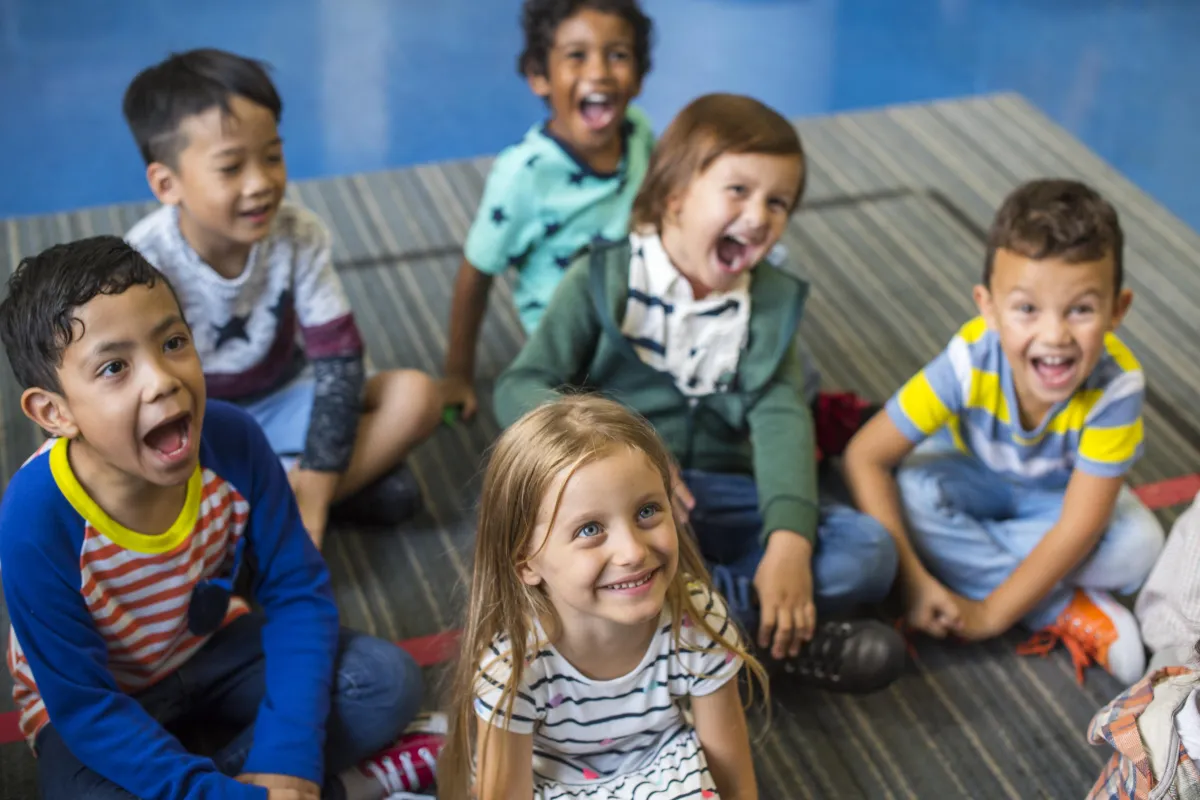 Structured educational program balanced with group and individual exploration and play