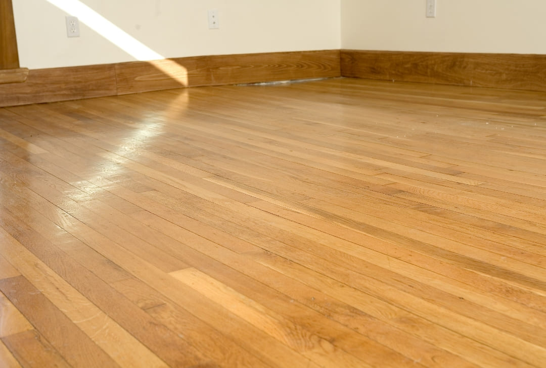 clean wooden floors with a new wax shine