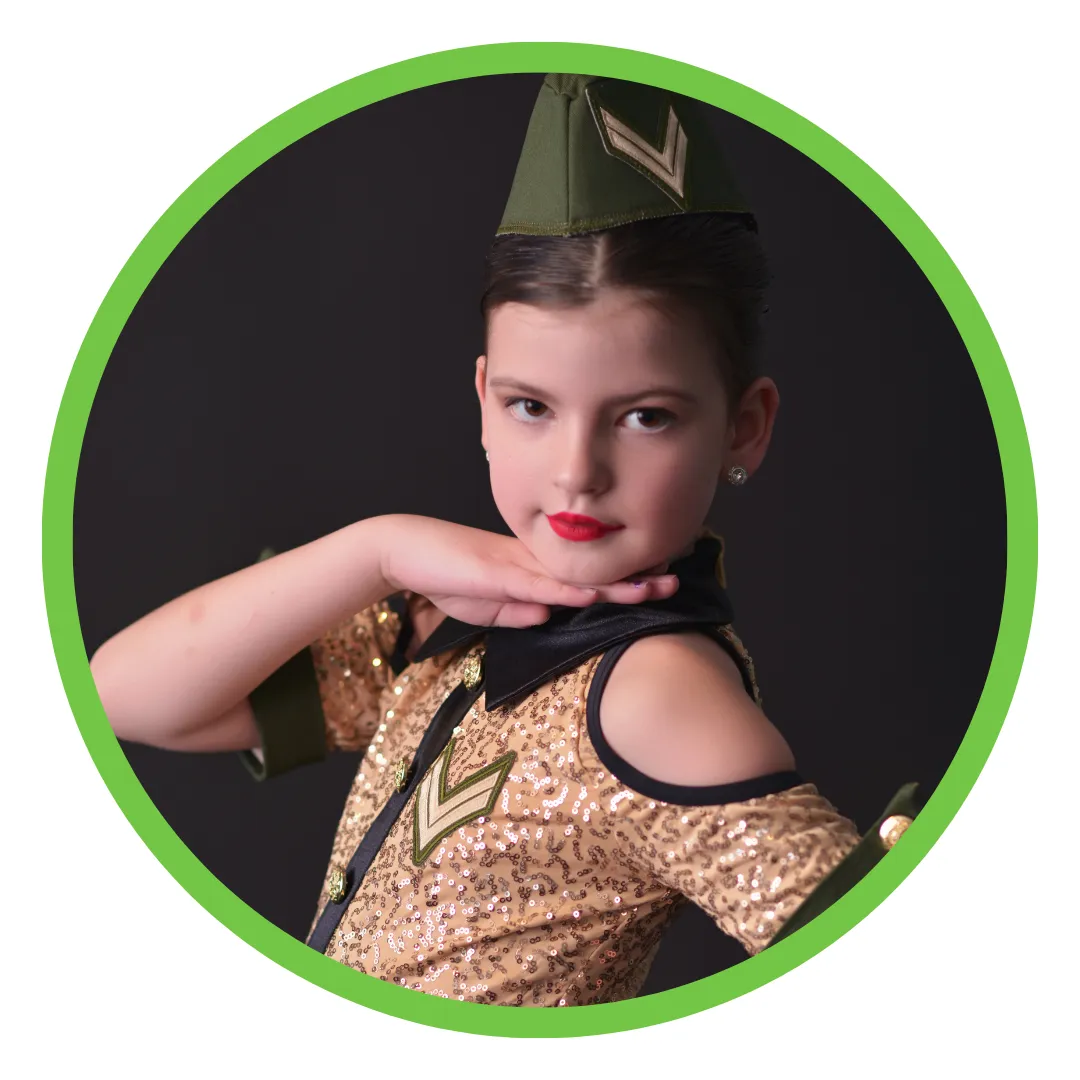 Girl with dark hair in green and gold costume