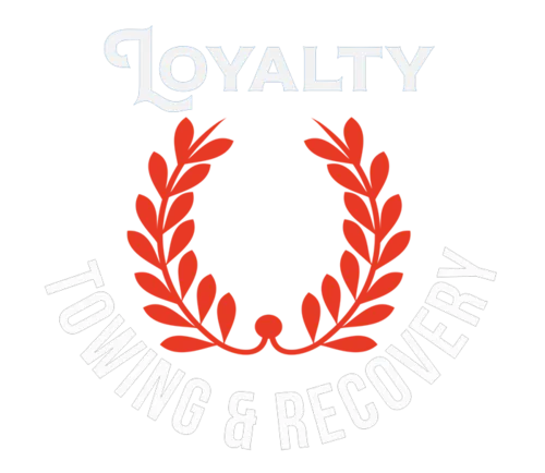 car on flatbed tow truck