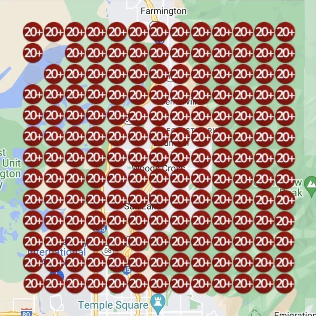 A heatmap of an area near Farmington, Utah. All the circles are now dark red and show the number "20+." This indicates a significant increase in the numbers across the entire map.
