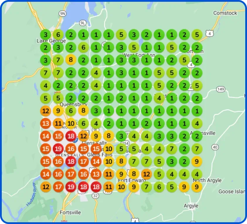 A heatmap of the Glens Falls, New York area, with significant changes from the "before" image. The circles are now a mix of green, yellow, orange, and red. The numbers range from 1 to 19, with a cluster of higher numbers (12-19) on the bottom left and a majority of lower numbers (1-9) across the rest of the map.