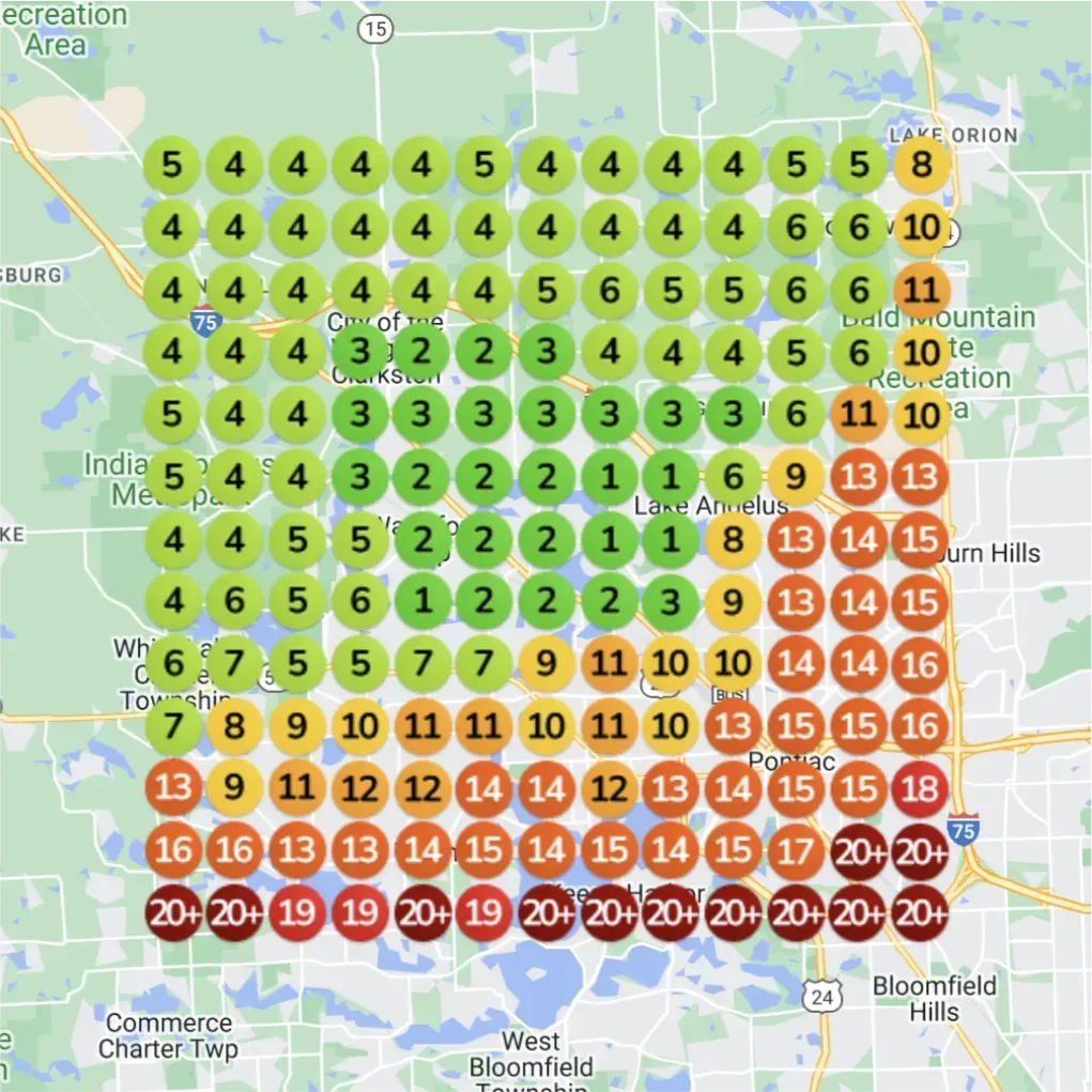 A heatmap of the Lake Orion and Pontiac, Michigan area. The circles at the bottom of the map are dark red and orange, with numbers ranging from 13 to 20+. The circles toward the top of the map are a mix of green and yellow, with numbers ranging from 1 to 11.