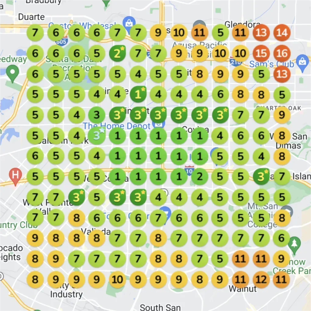 A heatmap of the Duarte and Covina, California area, showing a significant change from the "before" image. The circles at the top and bottom of the map are now dark red, orange, and yellow, with numbers ranging from 11 to 20+. The middle section of the map is a mix of green, yellow, and orange circles, with numbers from 1 to 15. The numbers across the entire map have increased.