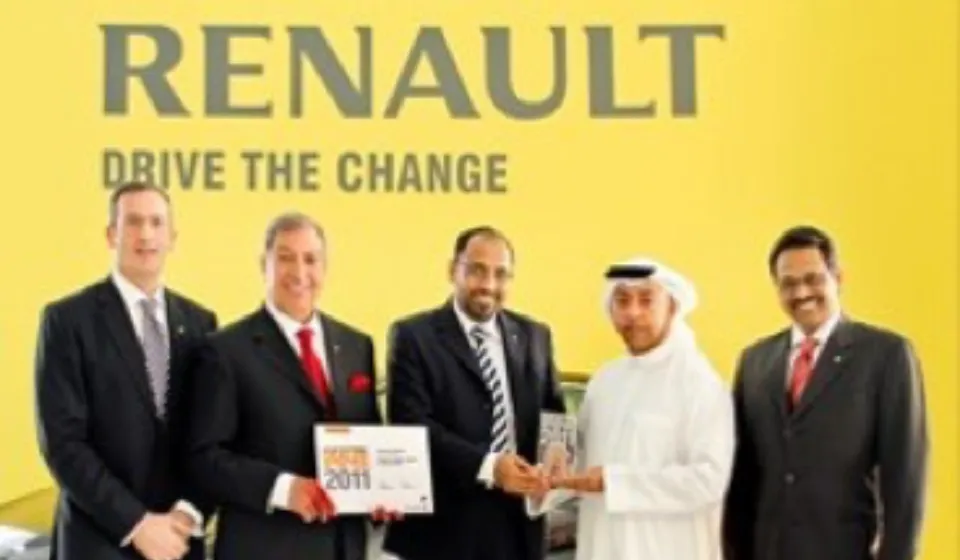 Claudio Camera receiving Dealer of the Year award in the Gulf region