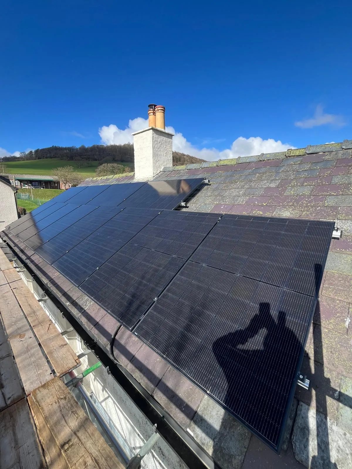 Solar panels that our solar company in Wales fitted on a old farm house