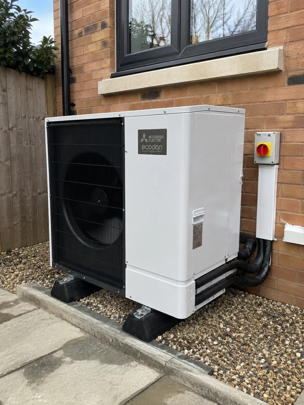  An air source heat pump in a garden in Pontypool