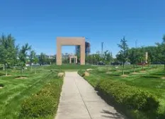 Spacious composite deck with lighting and pergola in Ballantyne