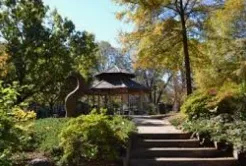 Cedar deck with classic railings behind Trinity Park home in Durham