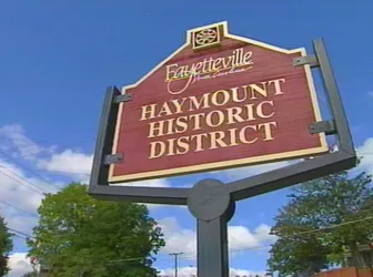 Cedar deck with traditional railings in Haymount neighborhood