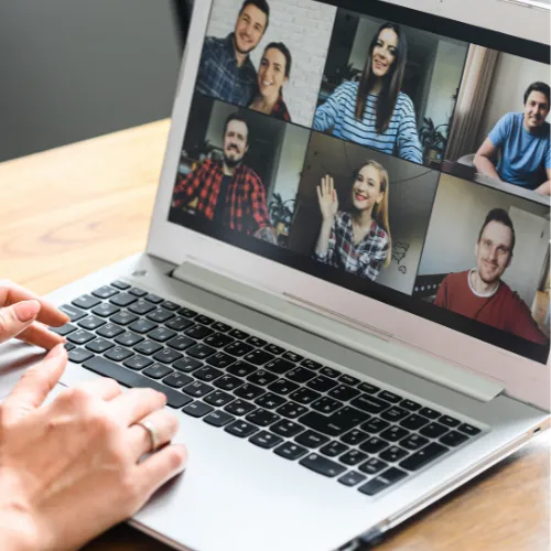 A laptop displaying a video call with multiple participants engaged in a Monthly Professional Learning Community (PLC). The caption highlights the opportunity for educators to join this monthly event, emphasizing collaboration and continuous learning in a supportive environment. The meeting occurs on the first Friday of every month at 8:00 AM CST, inviting educators to enhance their professional development.