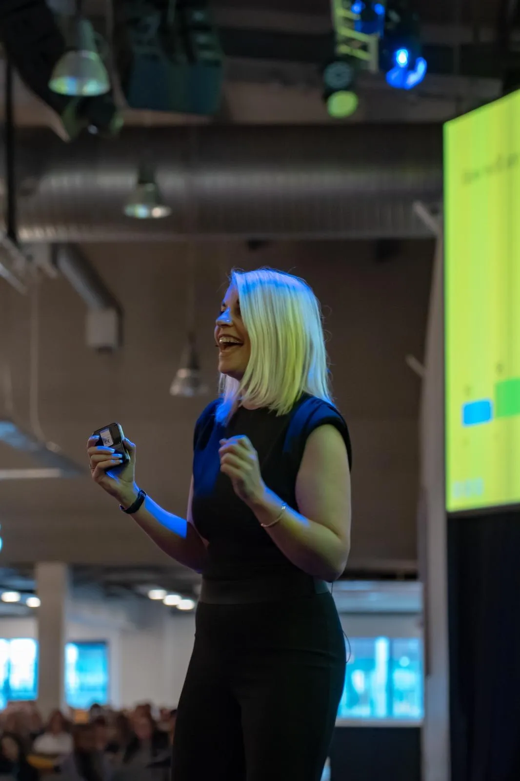 people standing on red and blue carousel during daytime