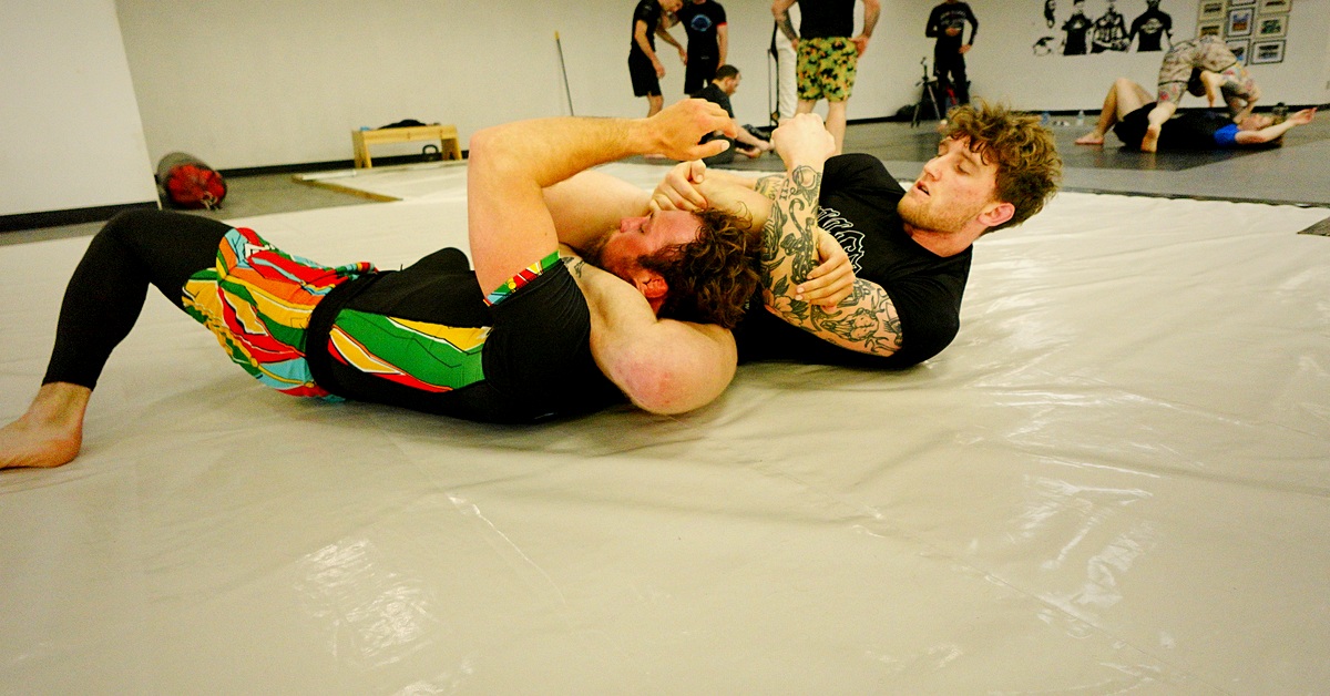 Adults drilling no-gi Brazilian Jiu Jitsu at 10th Planet Newark in Heath Ohio.