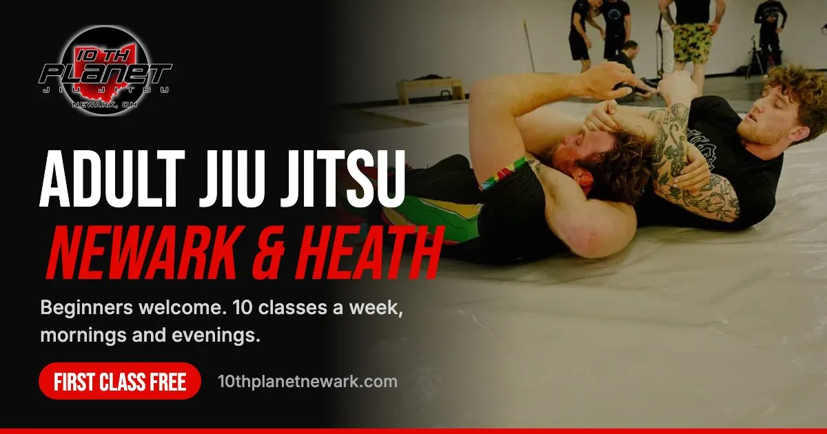 Two adults practising a jiu jitsu escape at 10th Planet Newark in Heath, Ohio