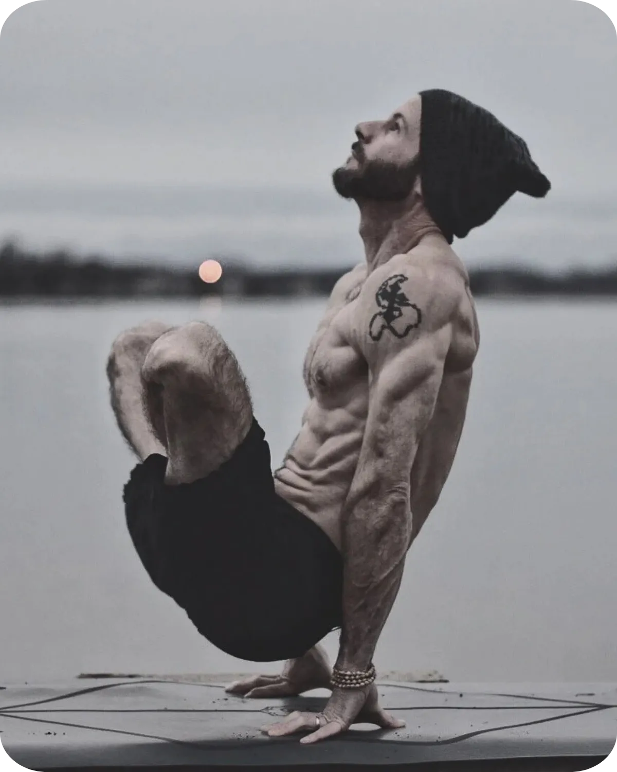 High-contrast black and white editorial portrait of Gerald Saluti, founder and wellness practitioner