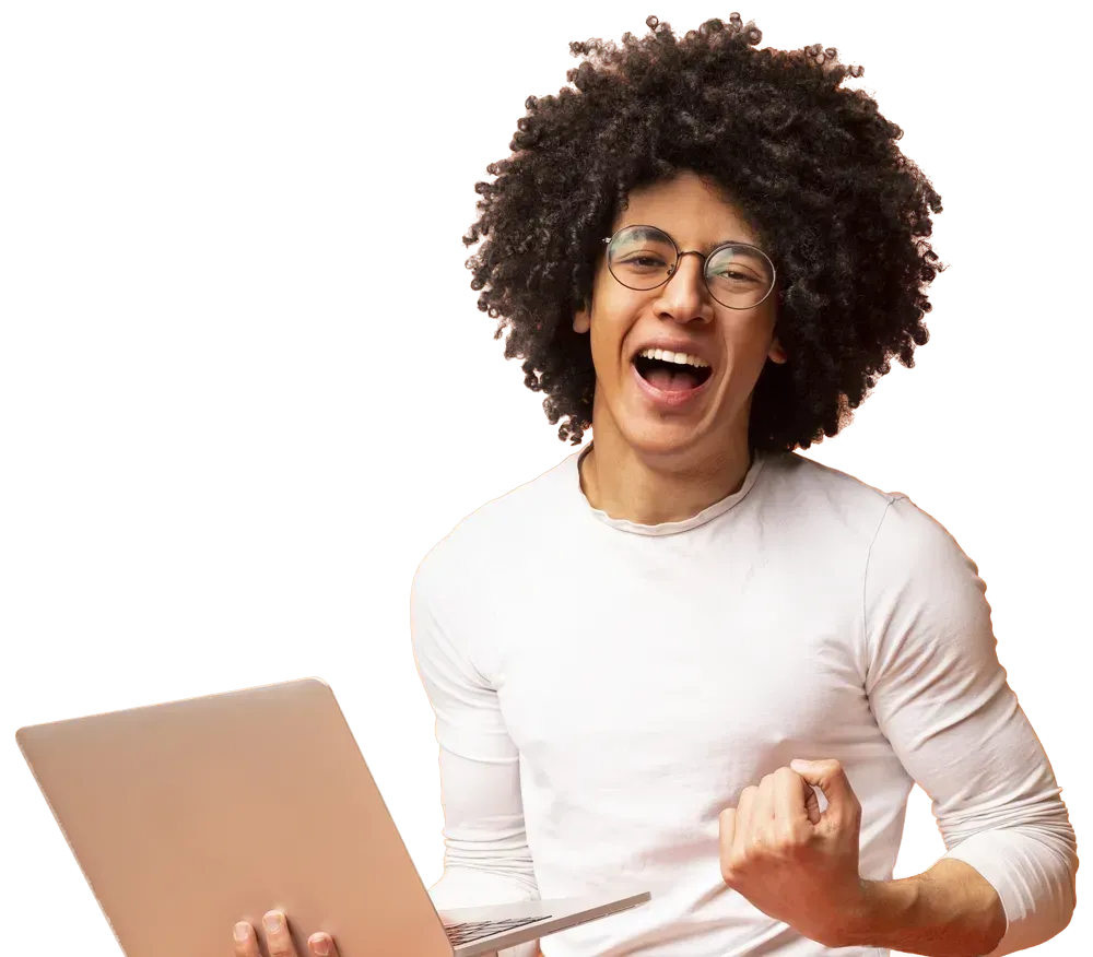 A man with an afro hairstyle is holding a laptop, showcasing a modern and professional appearance in a casual setting