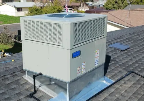 Crew installing insulation and sealing air leaks for improved home efficiency