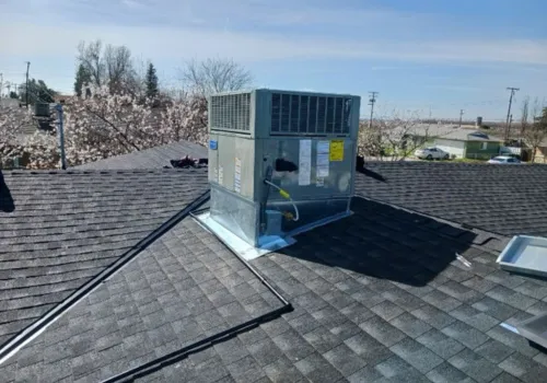 Technician performing HVAC tune-up to improve energy efficiency