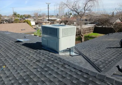 HVAC team installing high-efficiency heating and cooling equipment