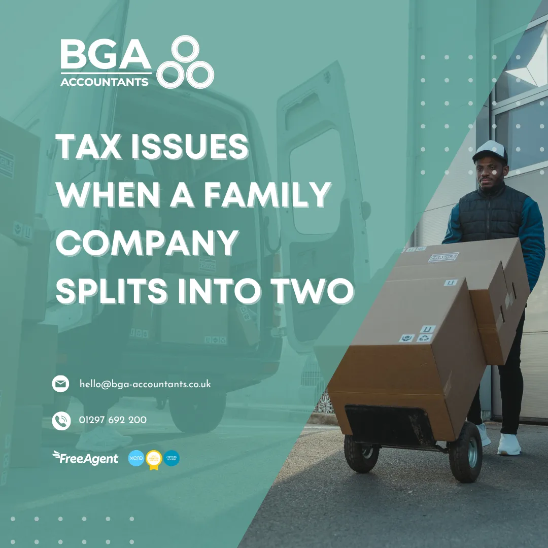 Worker unloading boxes from a van representing business restructuring and tax issues when a family company splits into two in the UK.