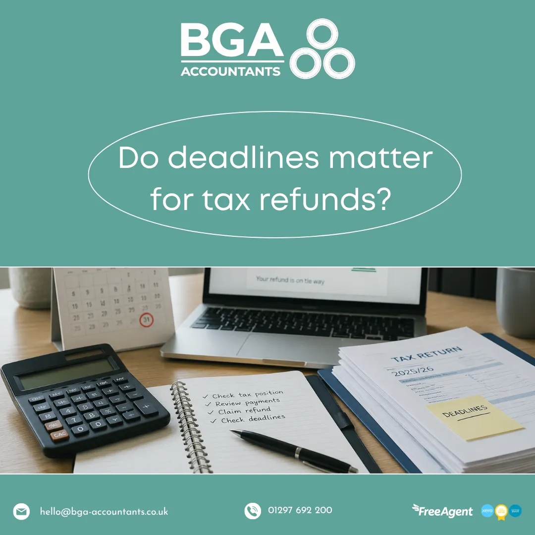 Tax return documents, calculator, calendar and laptop representing tax refunds and important filing deadlines.