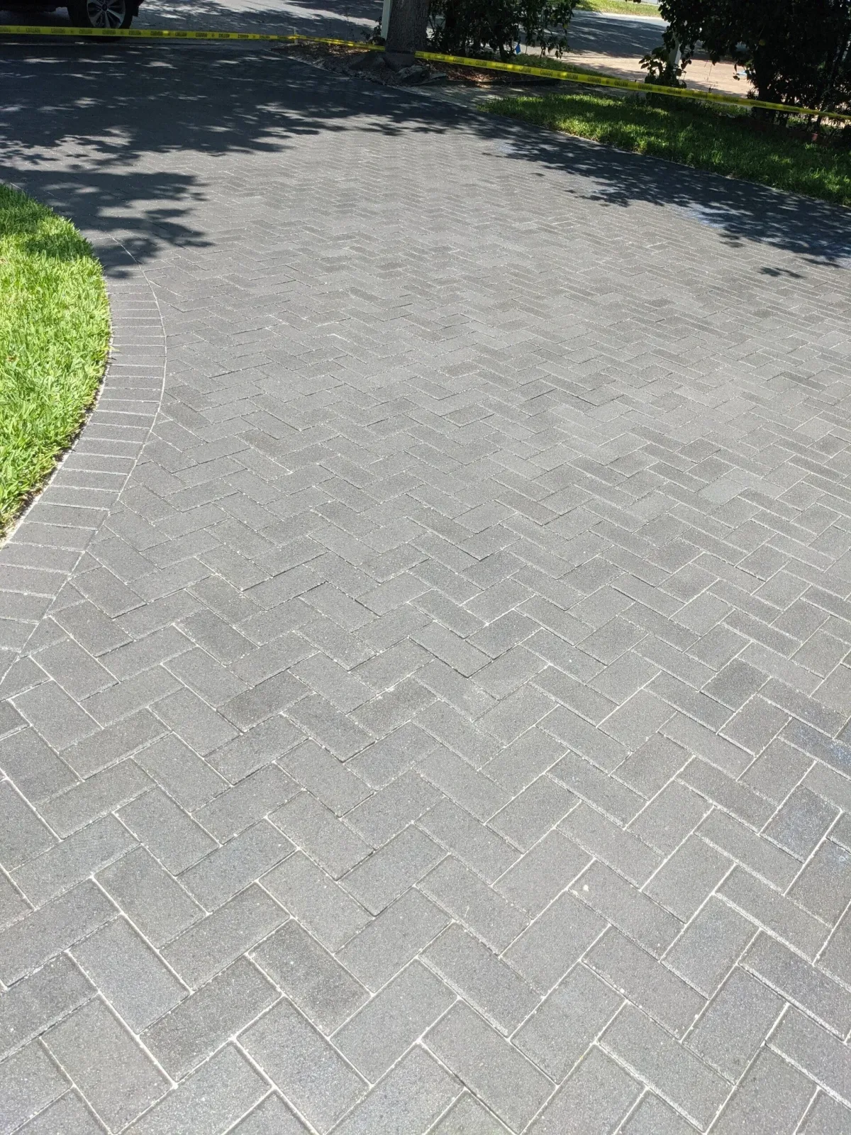 Grey driveway paver sealing