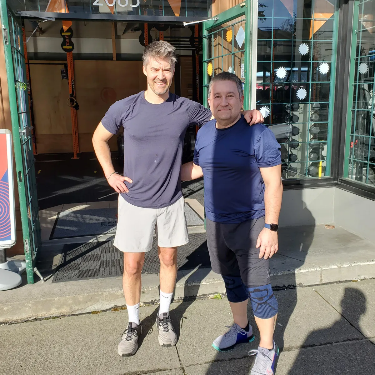 Two athletes who just completed a WOD at Empower