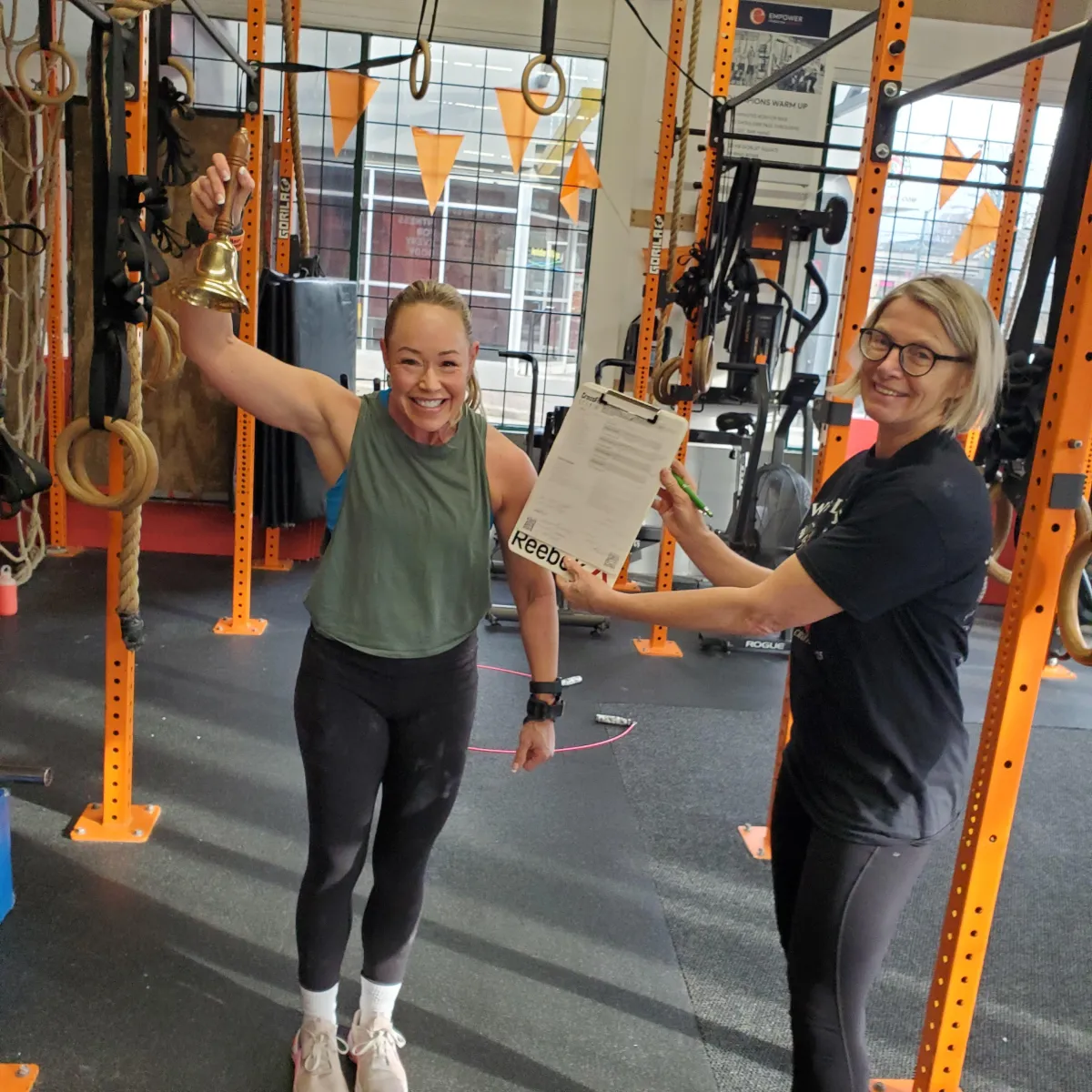 Two athletes celebrating a personal best in Vancouver