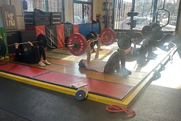 Lift Over 40 members doing bench presses