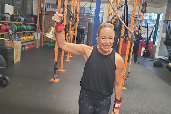 Group class doing ring rows in Vancouver, BC