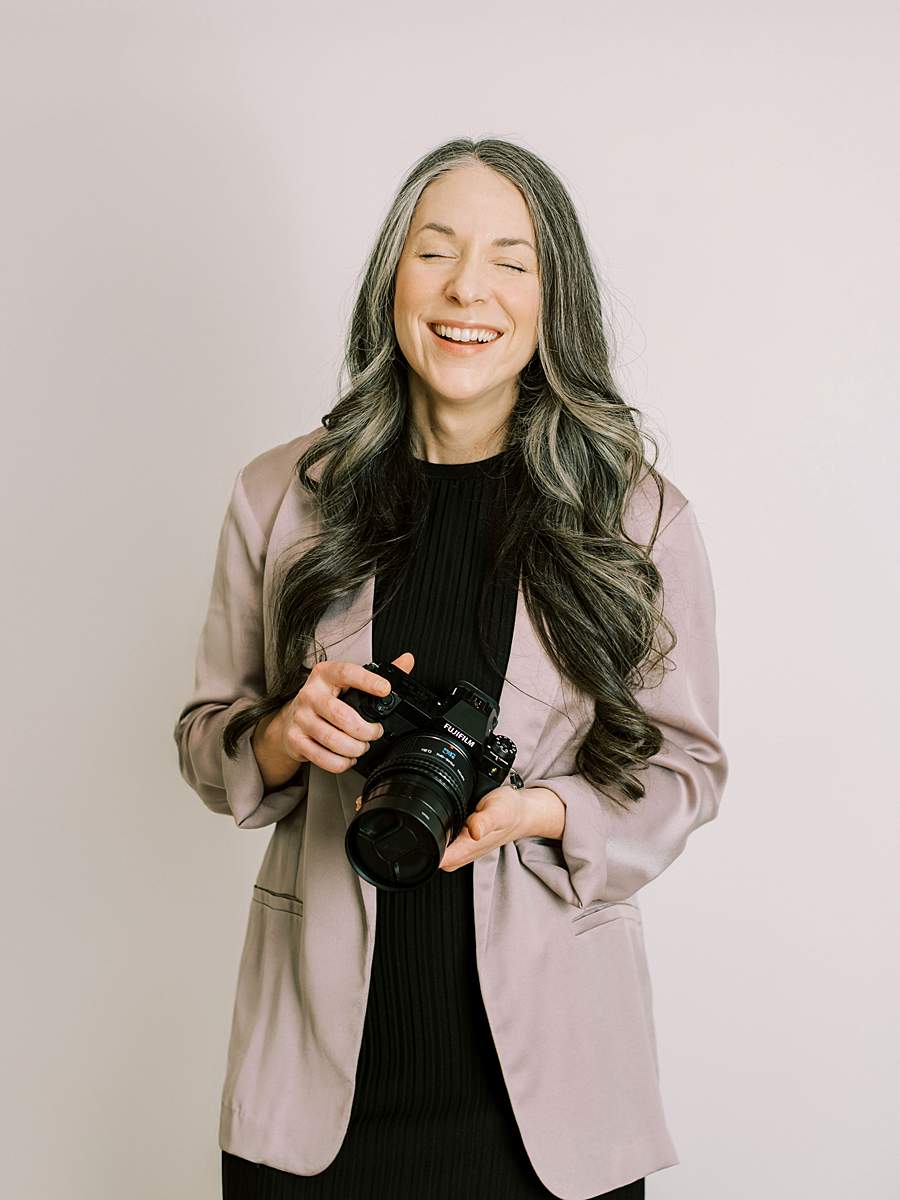 Professional headshot of woman wearing a pink blazer, Tri-Cities TN