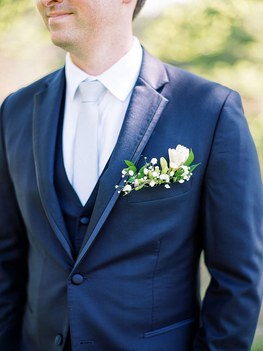 Detail photo of grooms boutonniere, east tn wedding.