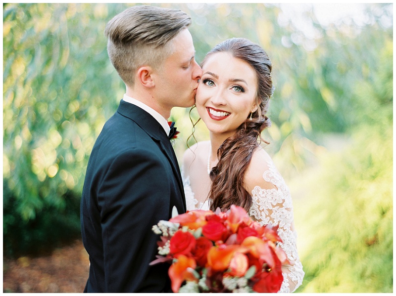 Historic allandale mansion couple posing for wedding photos