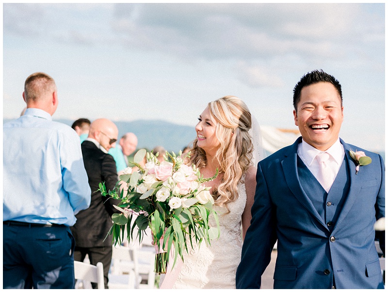 Bride and groom portrait with scenic backdrop at The Homeplace at Johnston Farm wedding