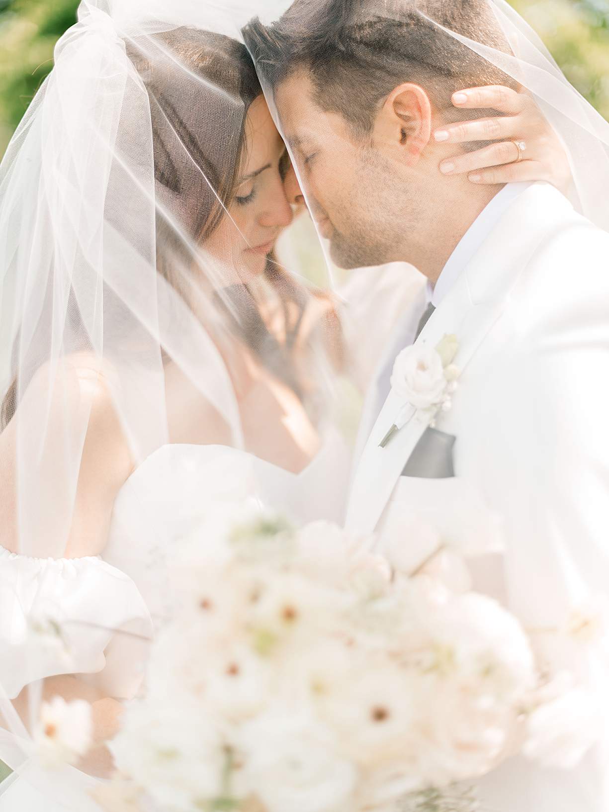 Elegant wedding couple portrait in warm golden hour light