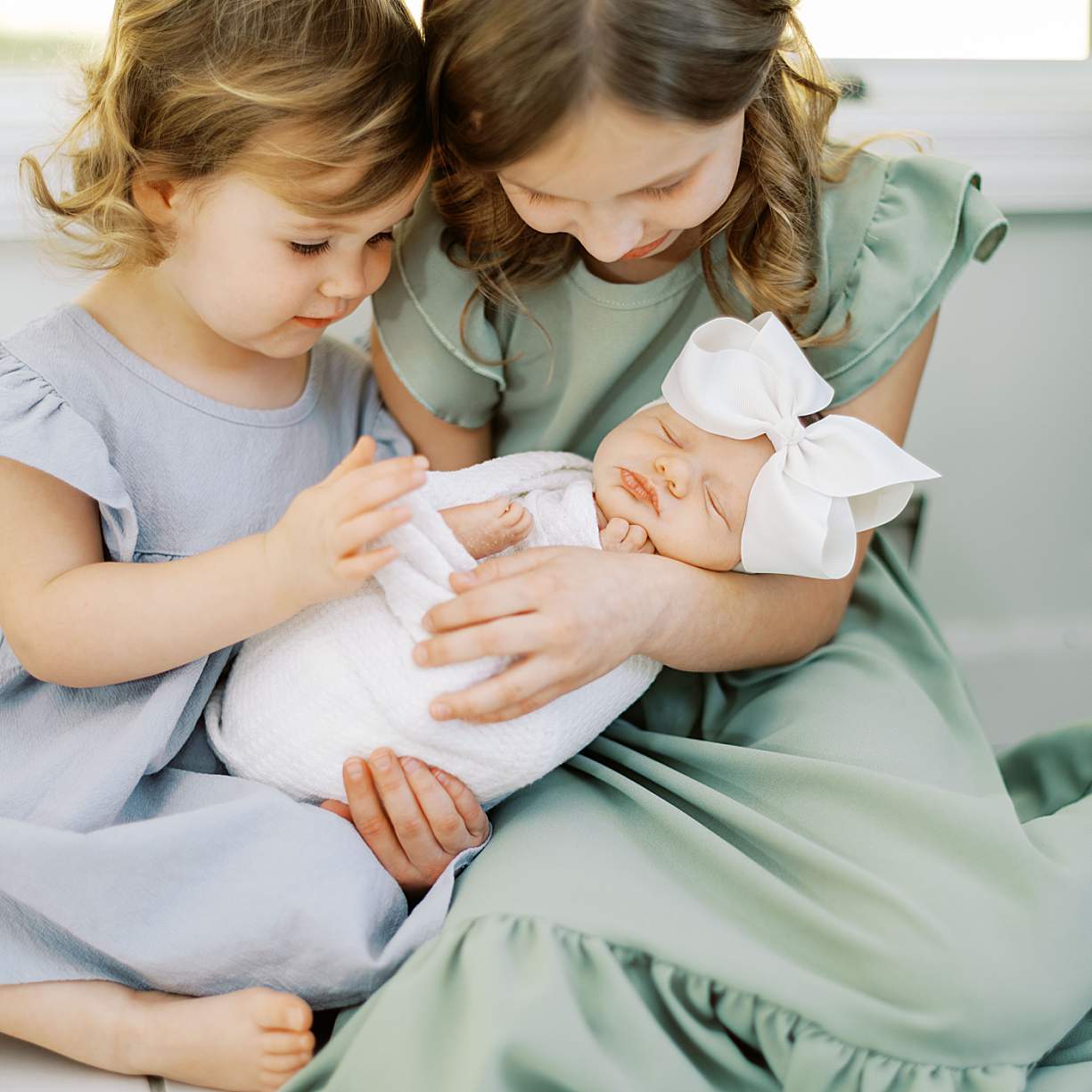 East Tennessee newborn photographer posing sleeping baby in fine art style
