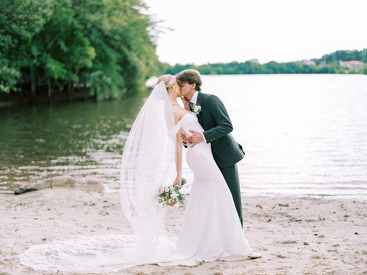 Bride and groom embracing during sunset wedding in East Tennessee