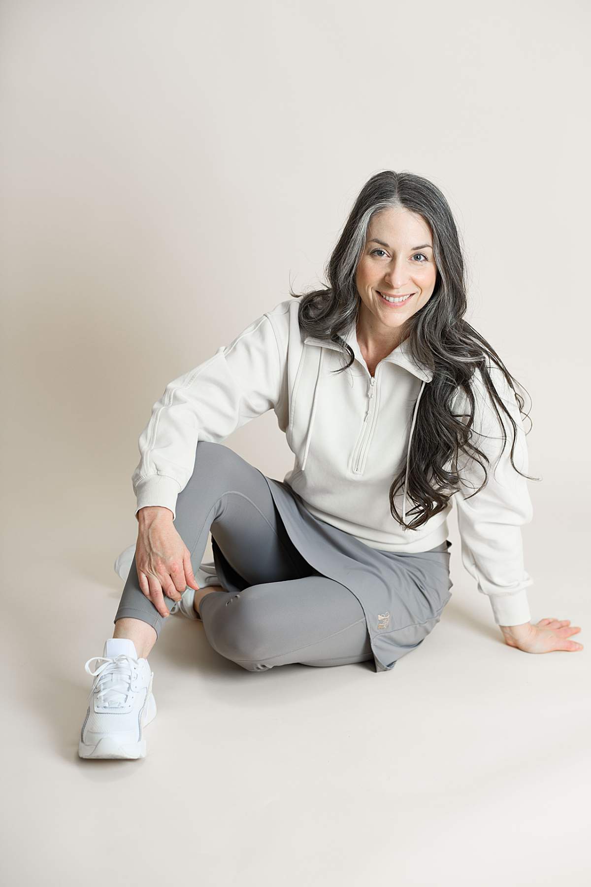 Woman wearing trendy modest athletic clothing