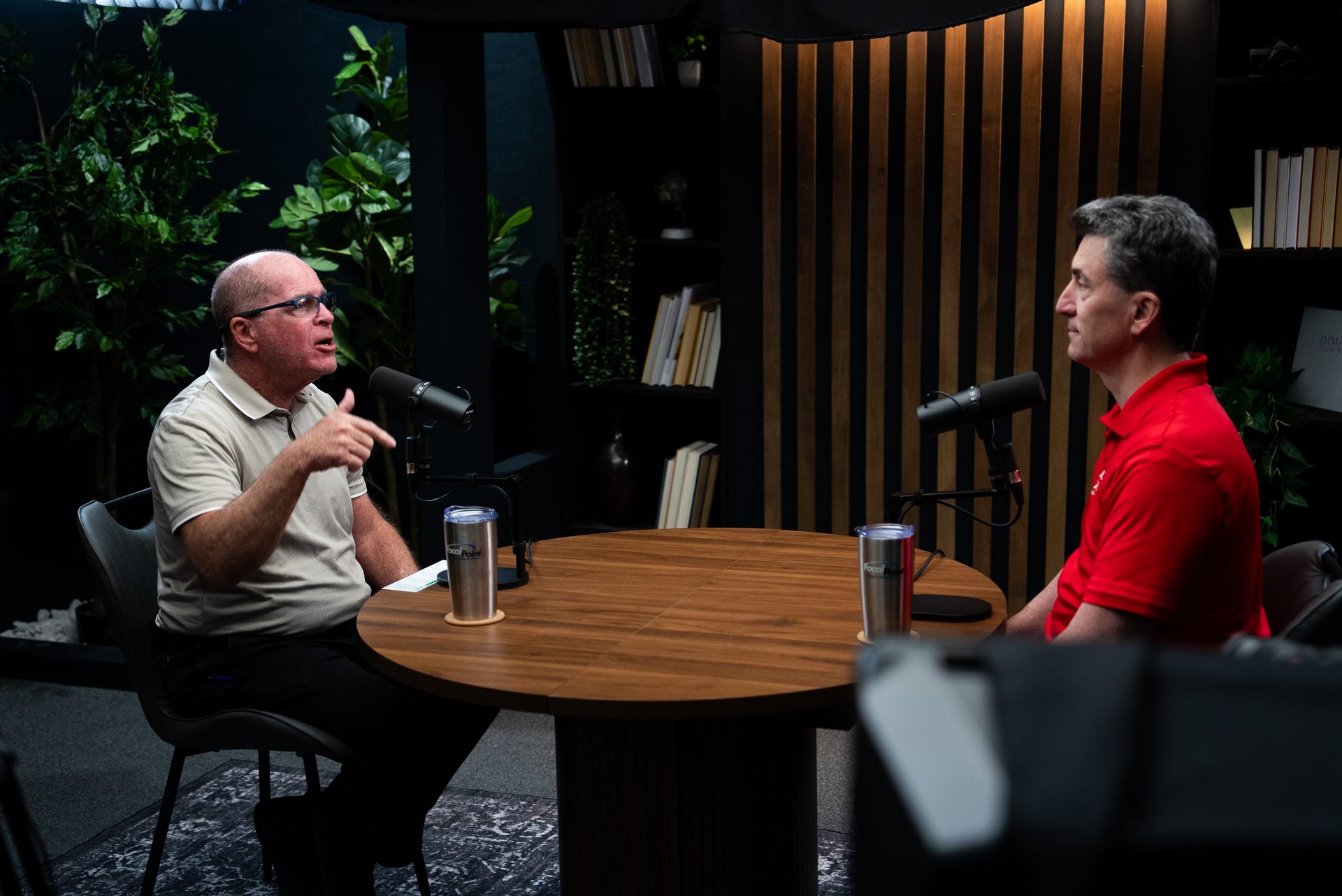Professional lighting and camera setup in a podcast studio
