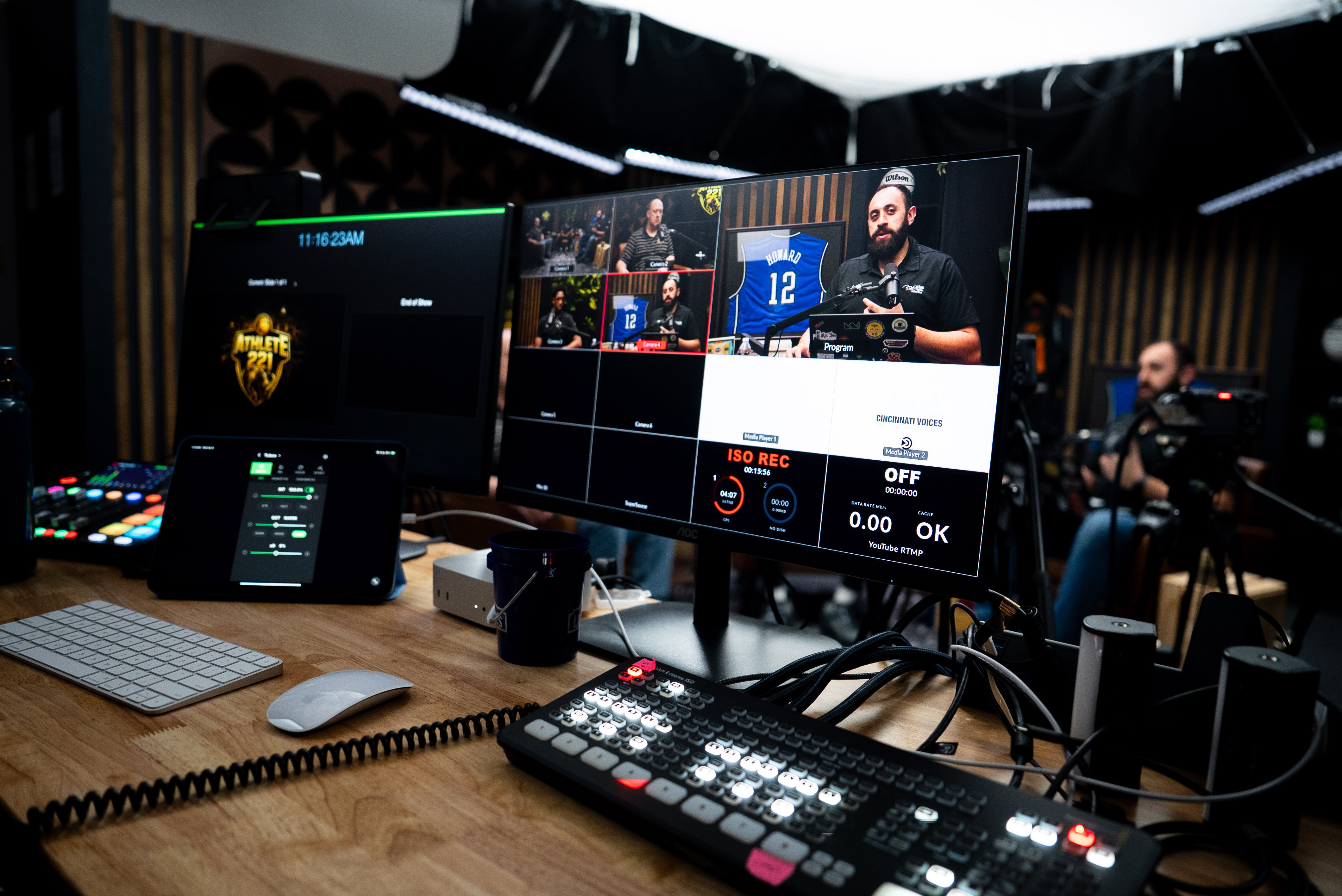 Live production control room with broadcast switcher and monitors for professional webinar recording