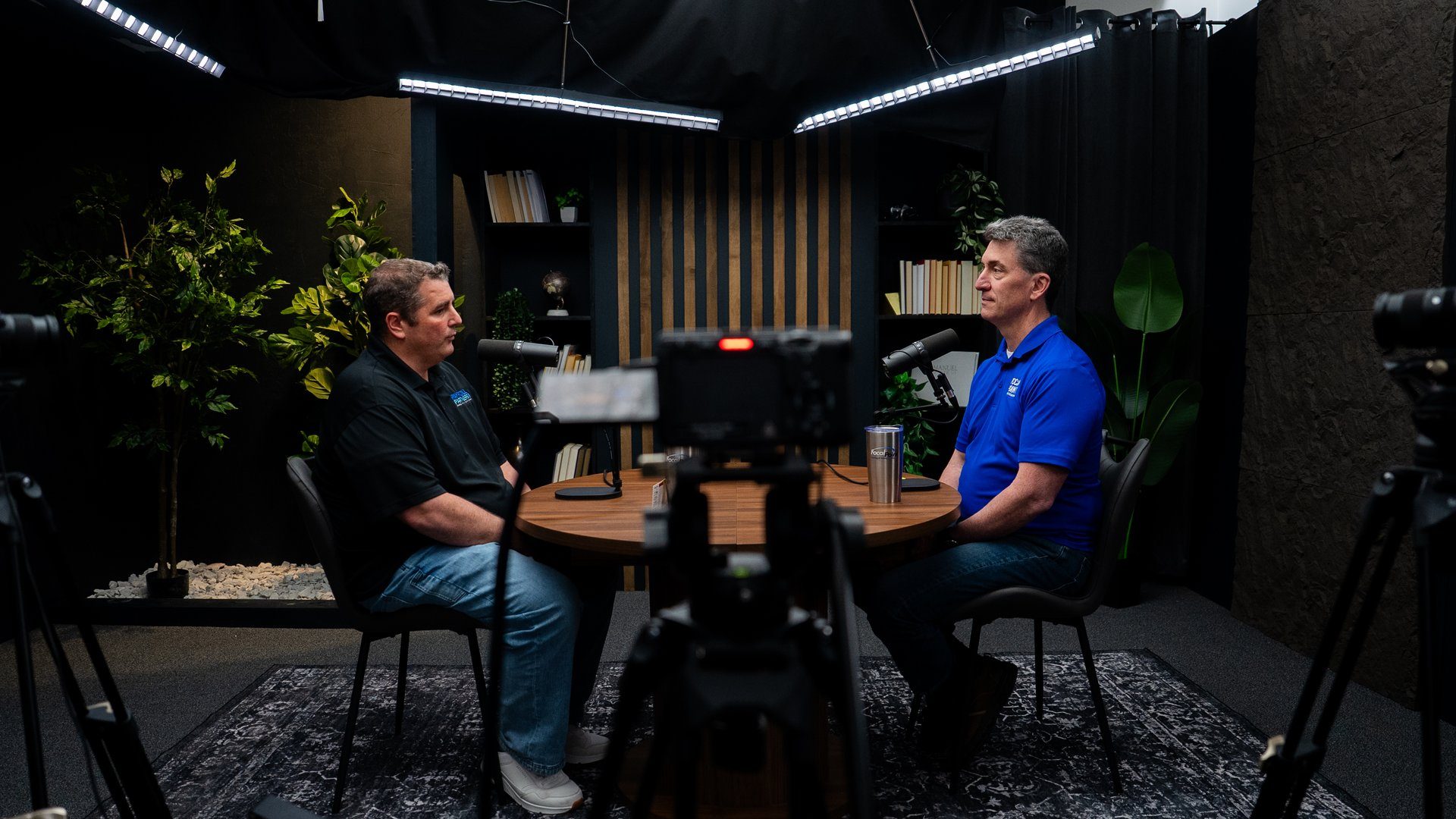 Recording session in progress at a professional video podcast studio