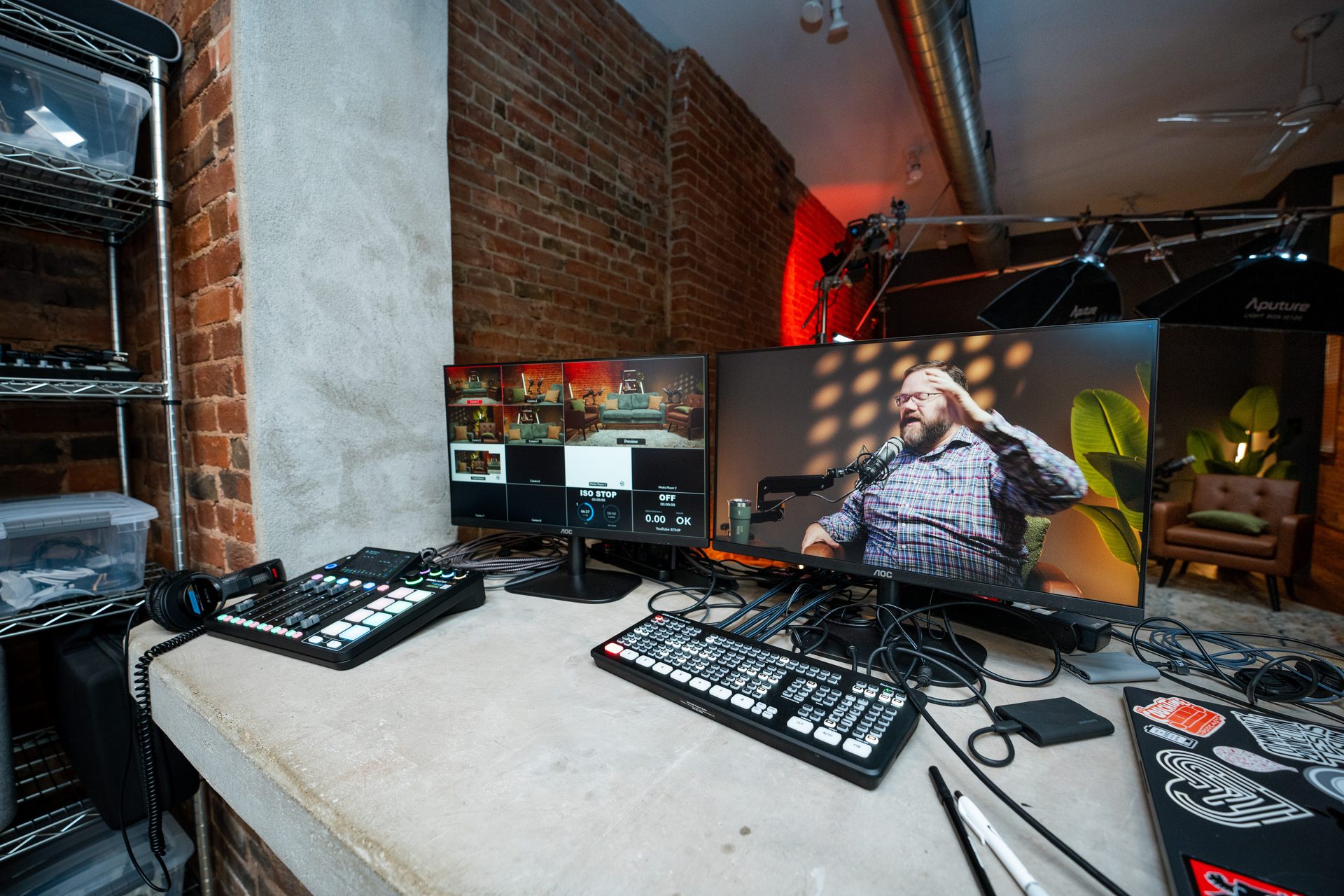 Wide studio shot with professional lighting and camera setup at Cincinnati Podcast Studio