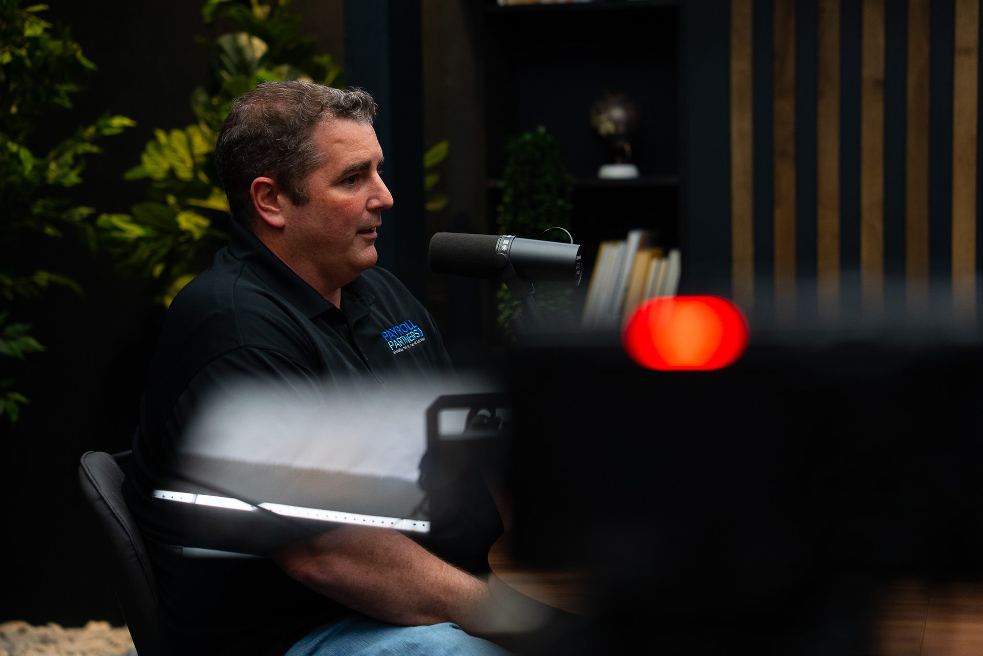 Presenter referencing notes during a course recording