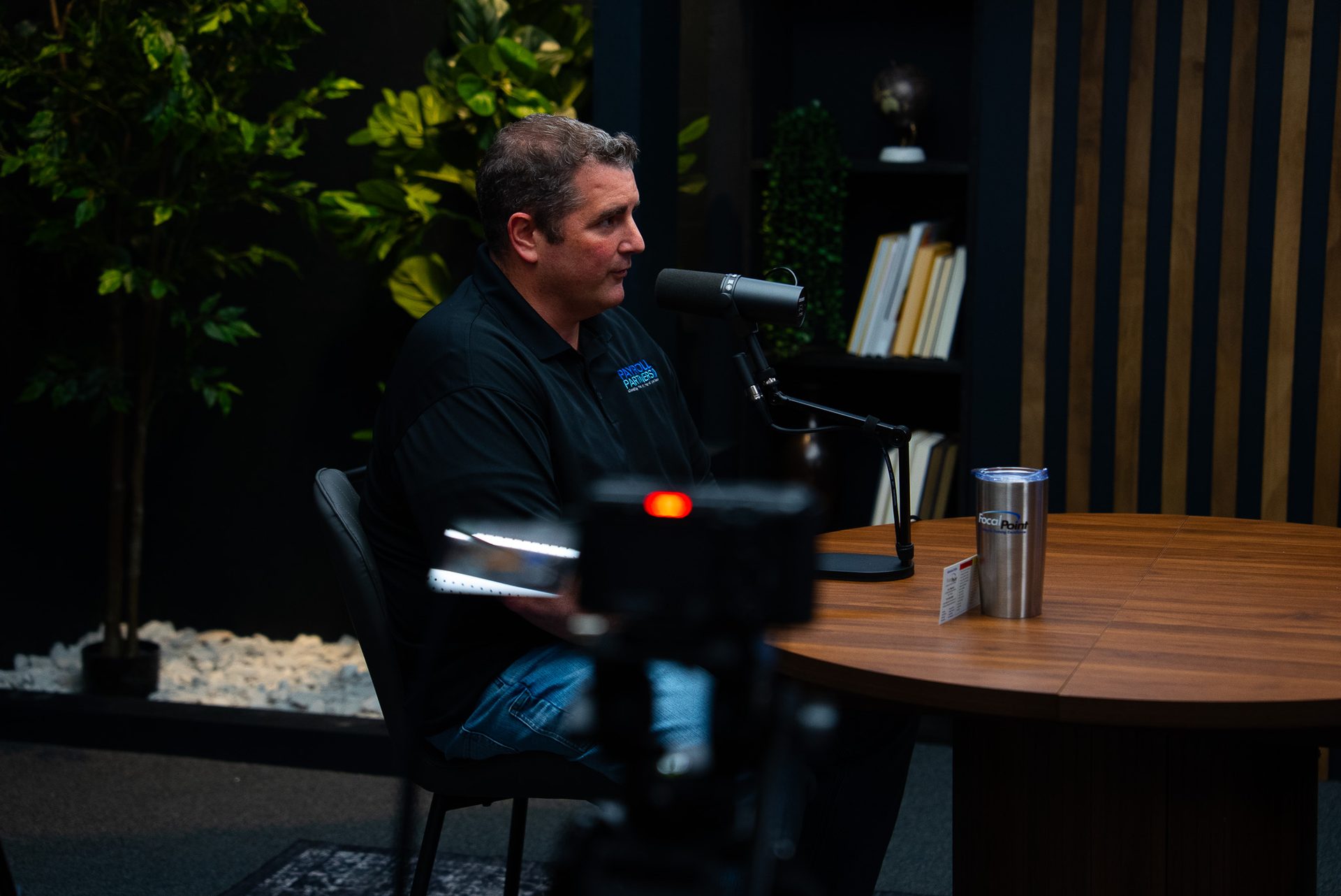 Recording session in progress at a professional video podcast studio