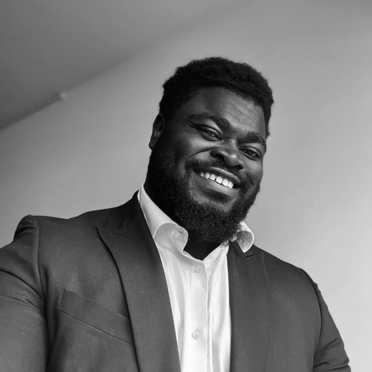Picture of Jeremy Twumasi Ampofo, who is the founder of Twumasi Group, who is smiling to mark the beginning of the Twumasi Group Website Launch