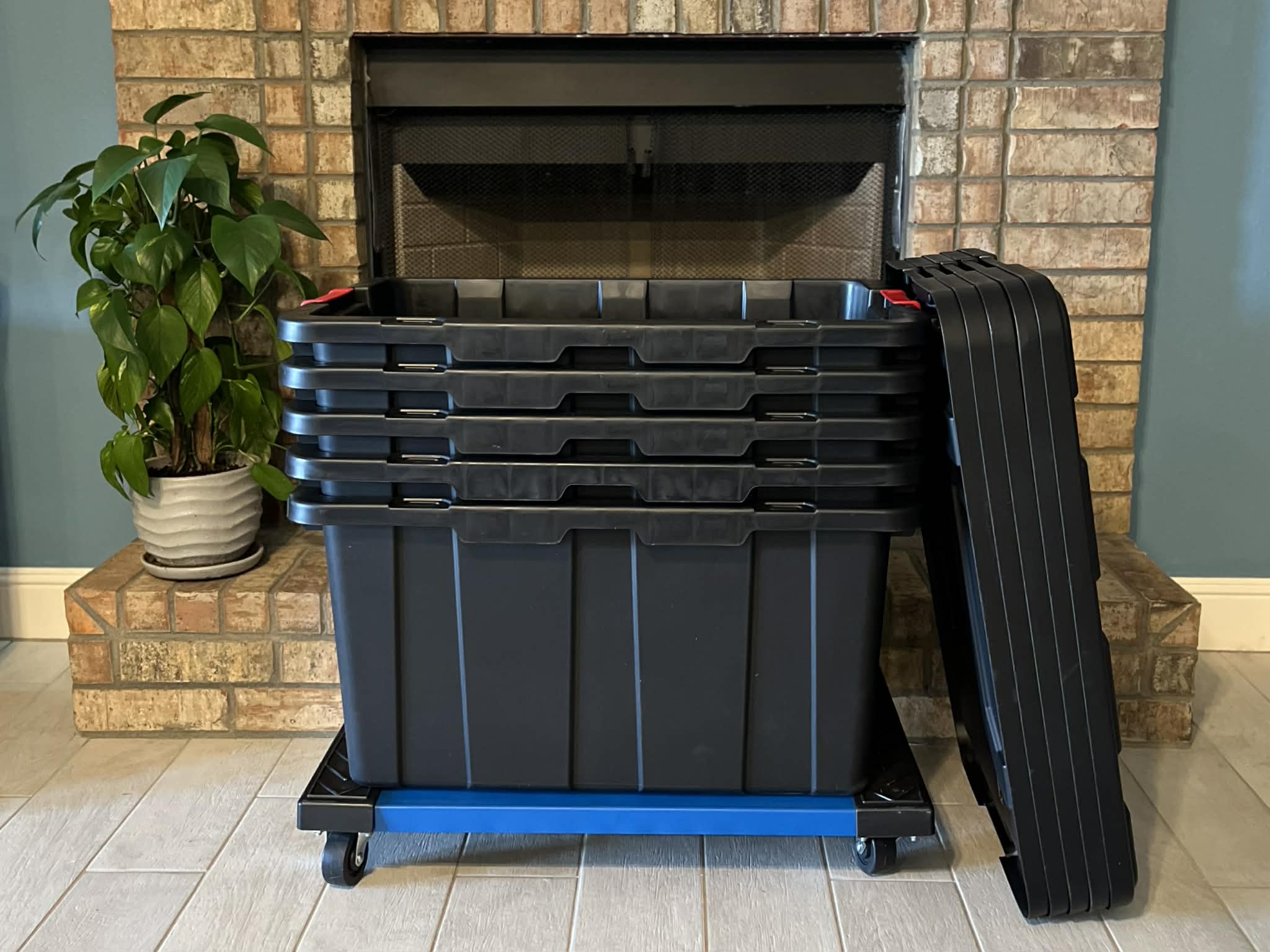 Family moving with green stackable totes