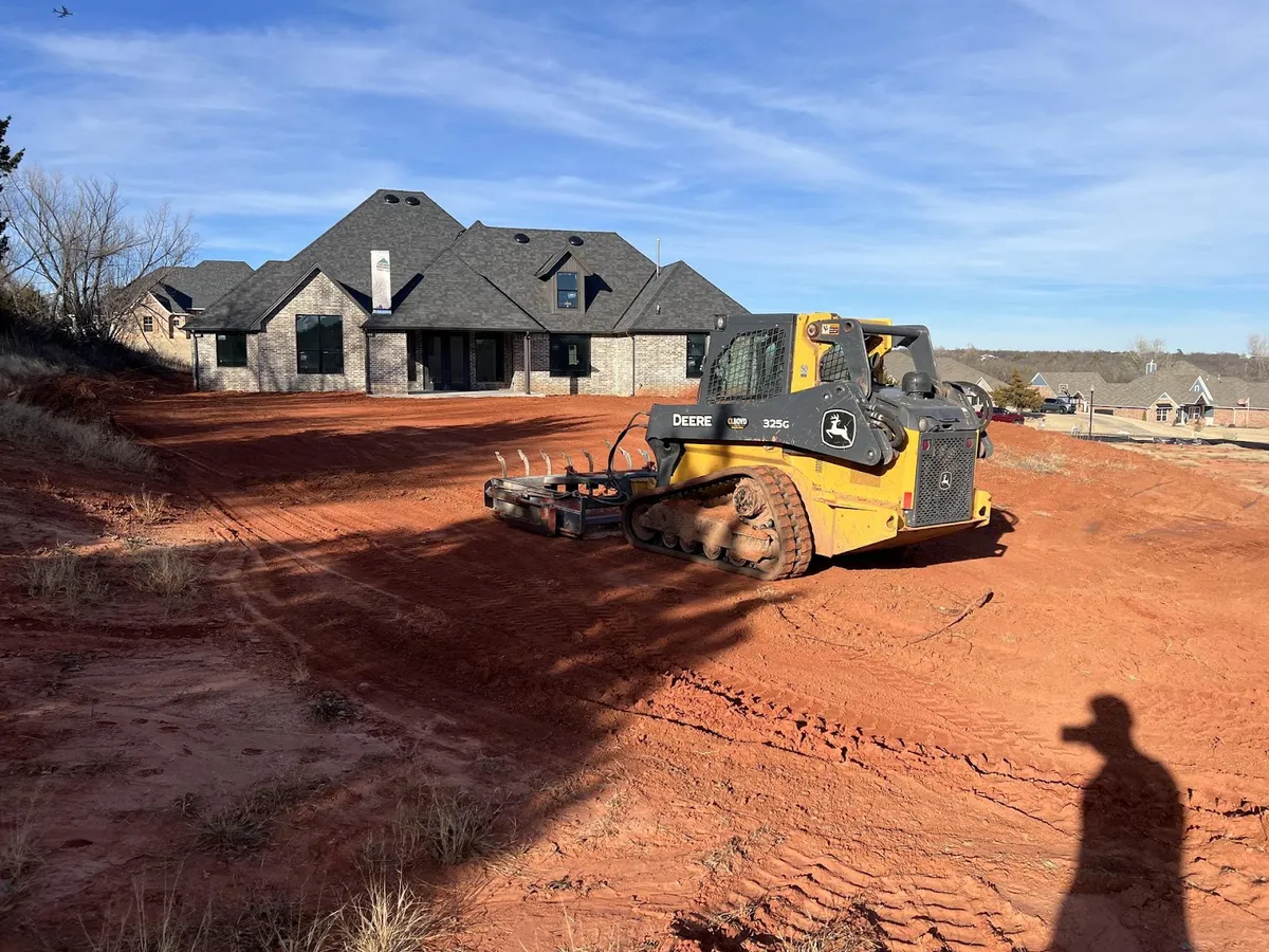 Skid Steer Service Oklahoma: Skid Steer vs. Backhoe